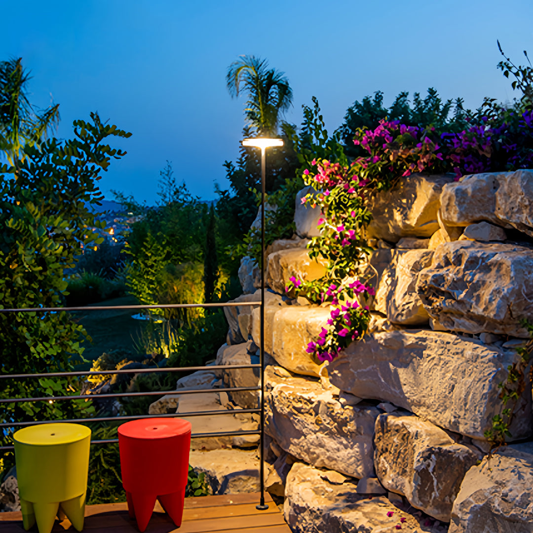 Stone stairway garden layout illuminated with multiple warm fixtures enhancing the outdoor lighting path.
