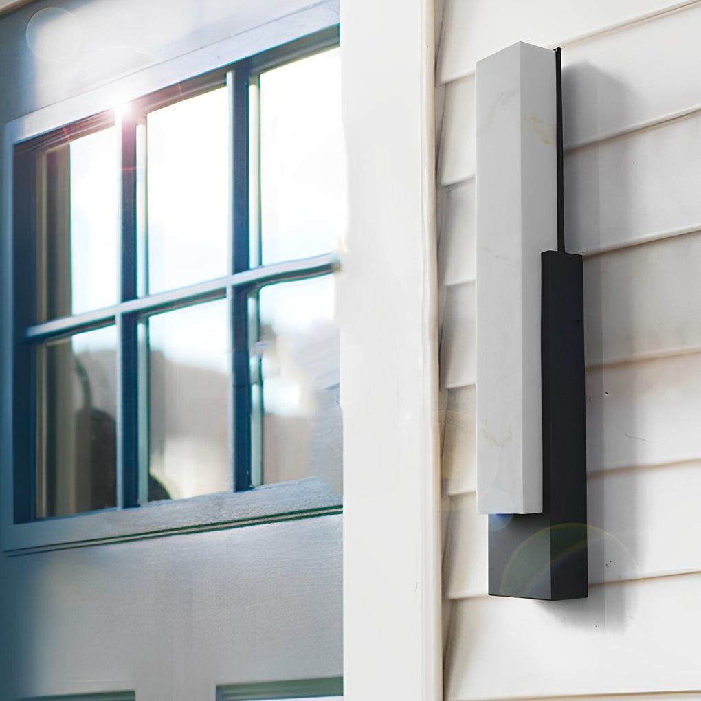 Stone texture wall light with a close-up of its textured surface and light.