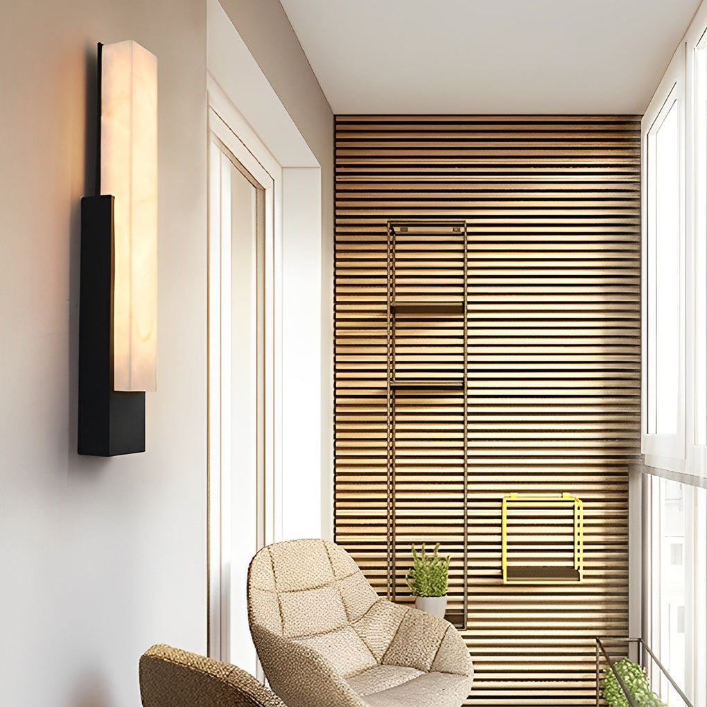 Stone texture wall light with a minimalist design, providing warm light near a balcony.