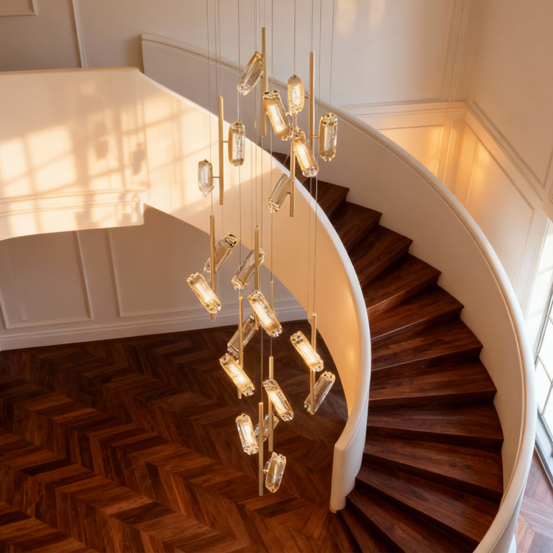 Stunning led staircase chandelier complementing curved wooden staircase in bright contemporary residential interior