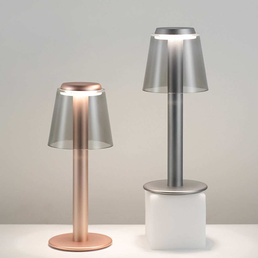 Stylish adjustable table lamp with silver and copper combination creating warm accent lighting
