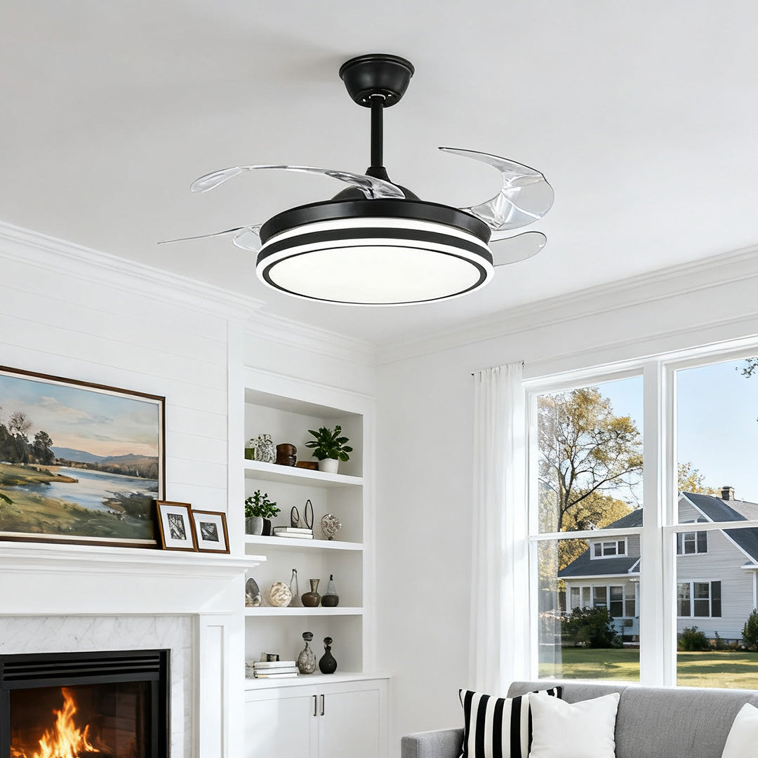Stylish black ceiling fan with lights illuminating a cozy farmhouse-style living space 