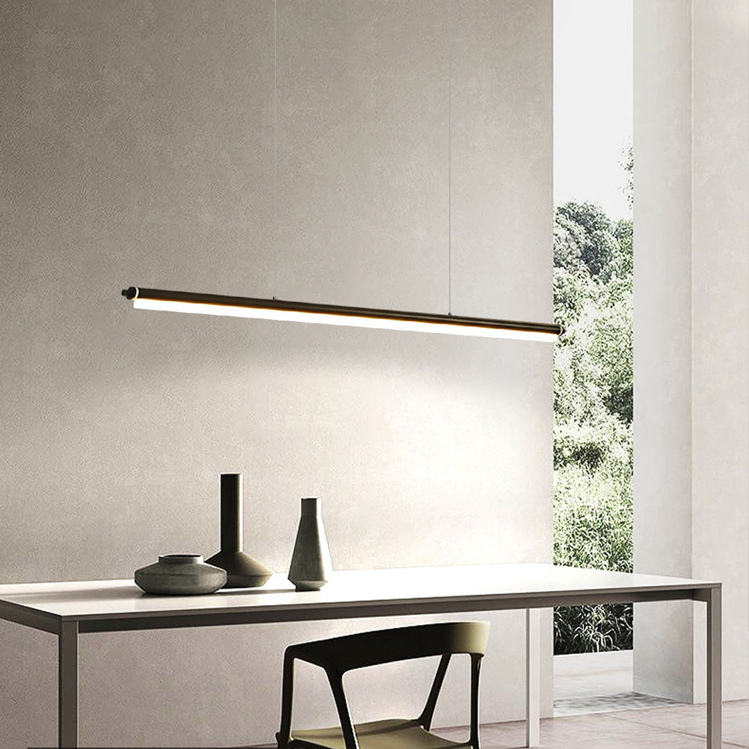 Stylish black metal pendant light providing task lighting over contemporary workspace area