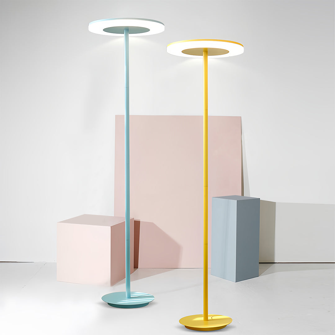 Stylish colored floor lamp collection displaying multiple vibrant finishes in modern interior setting