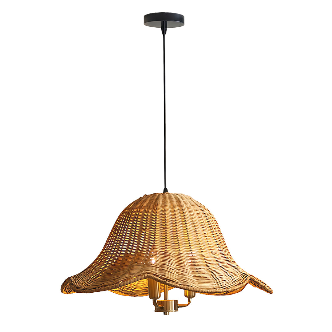 Stylish hanging rattan pendant light suspended above a kitchen counter, adding warmth and texture to the space.