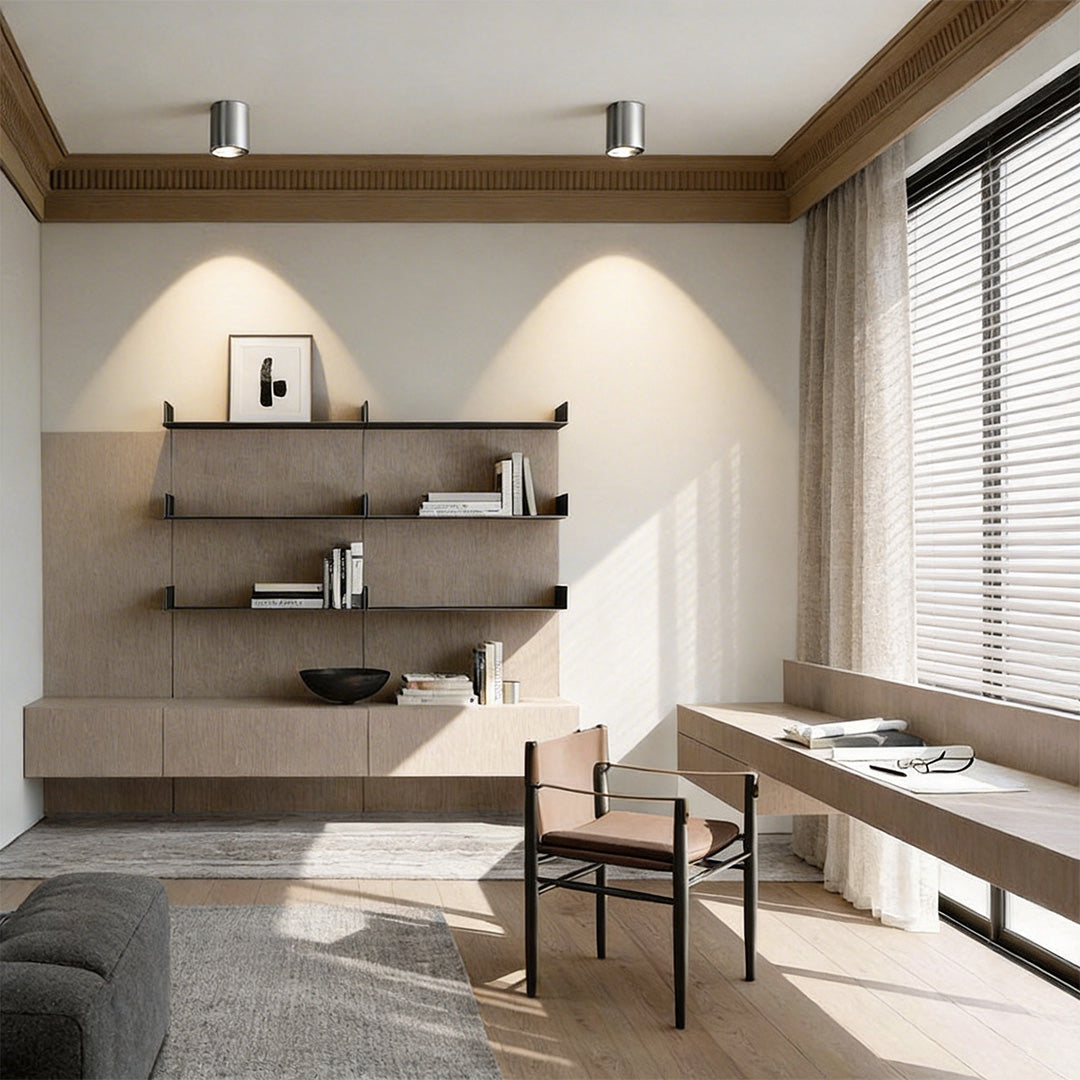 Stylish home office featuring surface mount can lights highlighting the workspace.