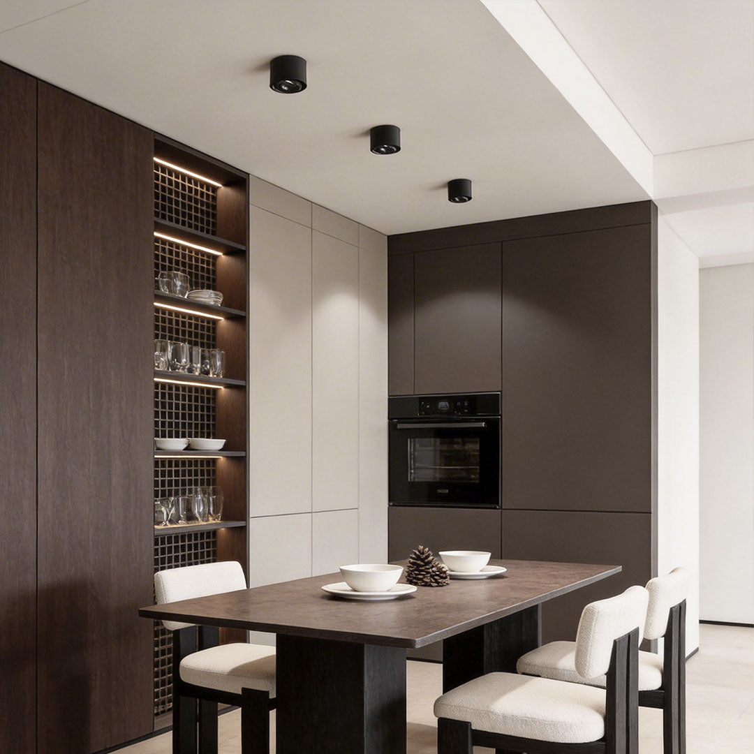 Stylish kitchen with ceiling spotlights accentuating the minimalist interior.