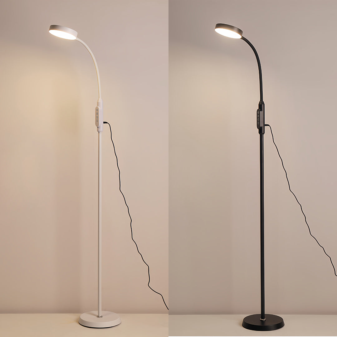 Stylish led reading floor lamp providing task lighting in contemporary living room with neutral decor