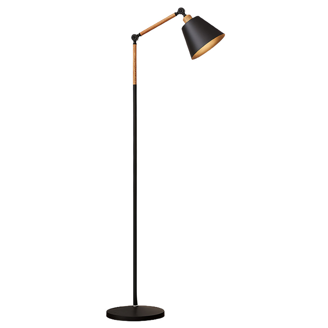 Stylish metallic floor lamp with black conical shade and brass arm in sophisticated bedroom decor