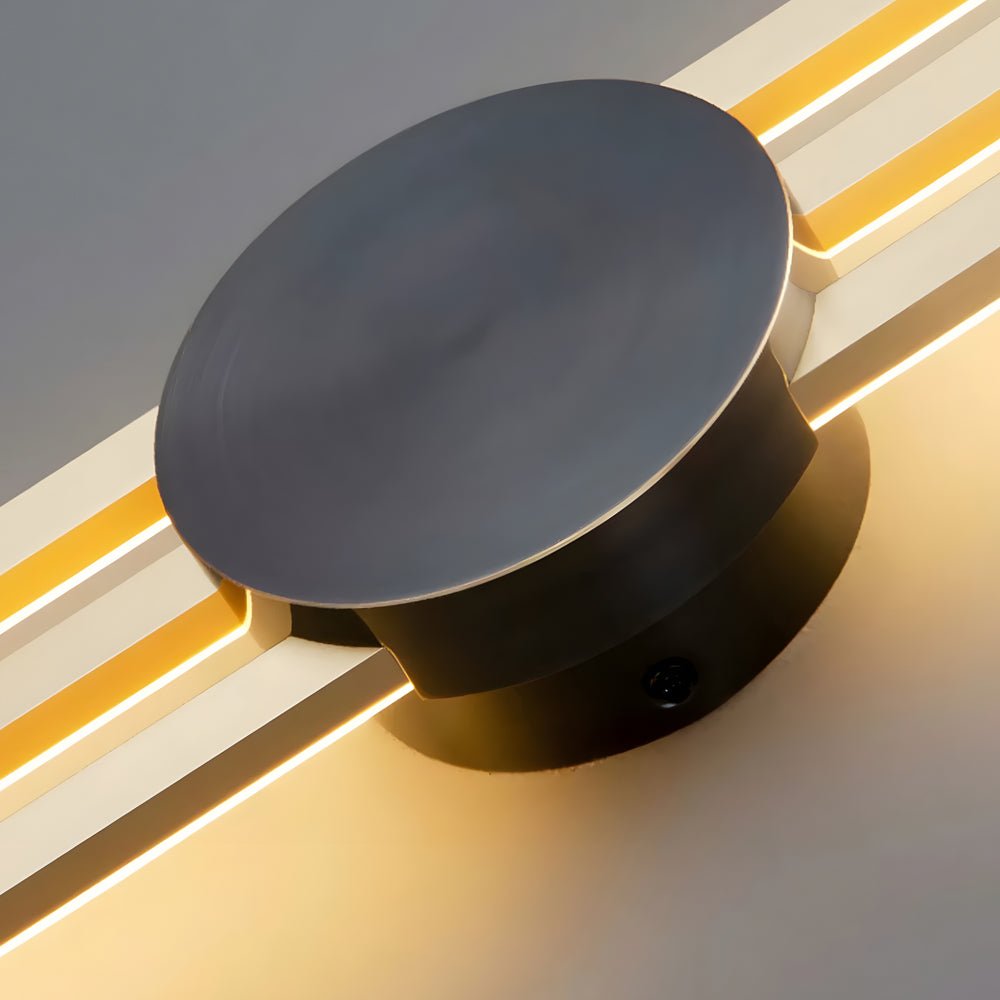 Stylish modern linear wall sconce with warm lighting and black/gold elements, perfect for enhancing any modern living space.