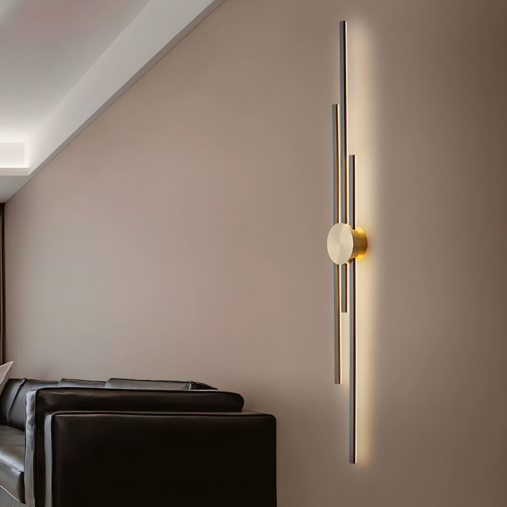 Stylish modern linear wall sconce with clean lines and a beautiful combination of gold and black for a luxurious ambiance.