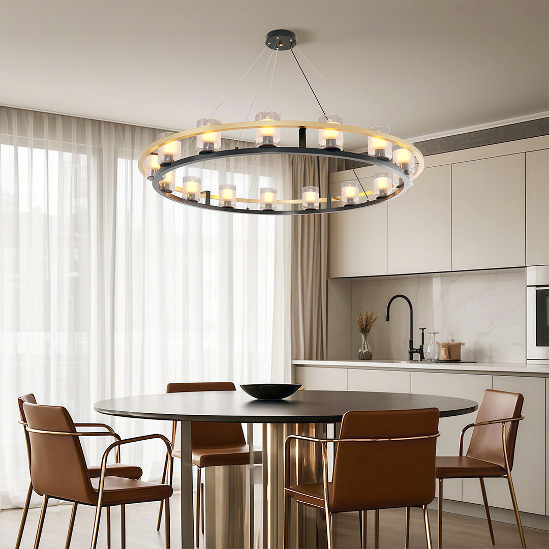 Stylish modern luxury chandeliers illuminating a contemporary kitchen island with sleek cabinetry.