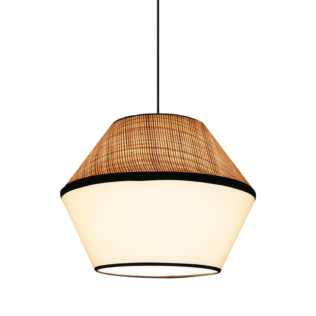 Stylish pendant light with a fabric shade suspended above a dining area, adding elegance and sophistication.