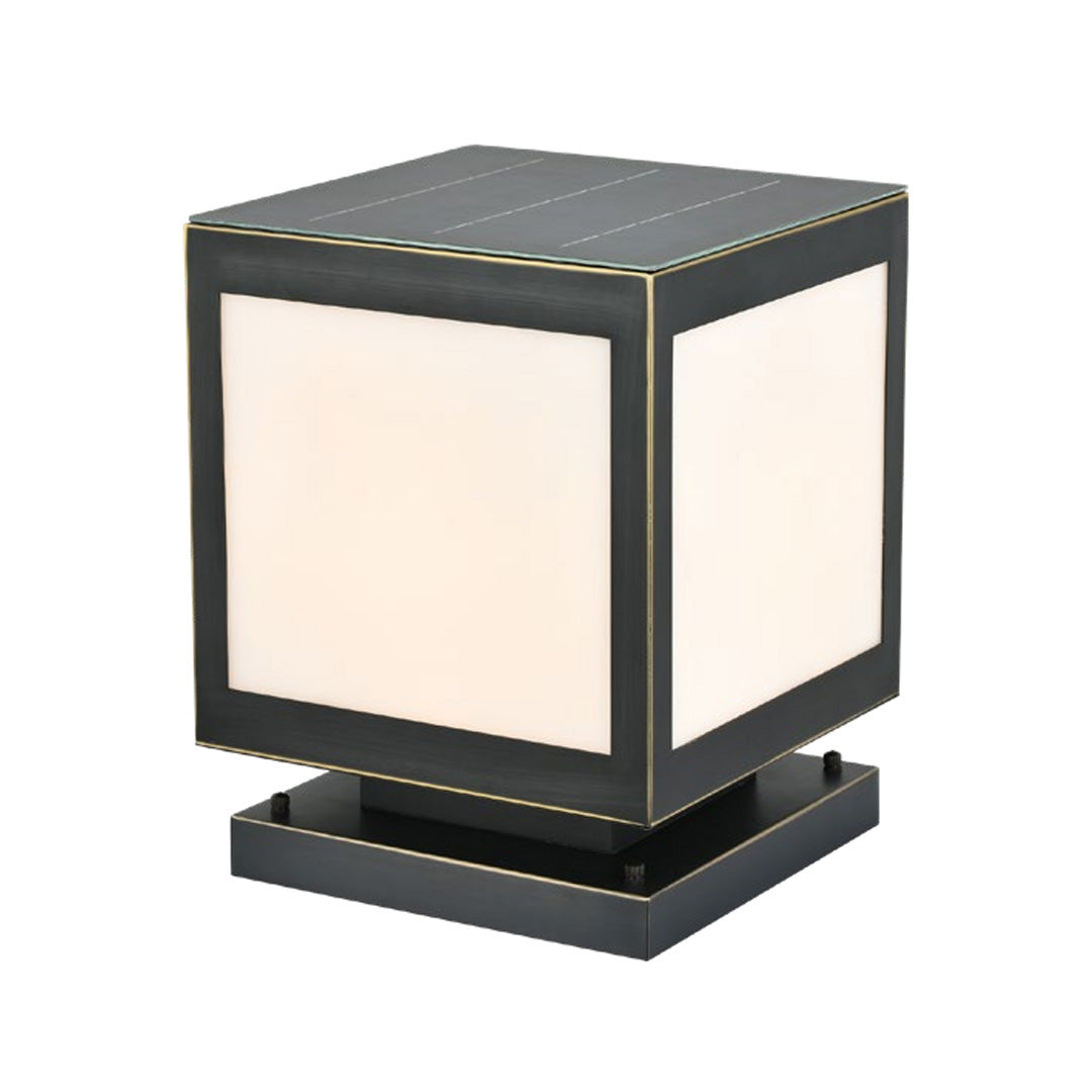 Stylish pillar solar light providing warm illumination for a modern outdoor pillar at night.