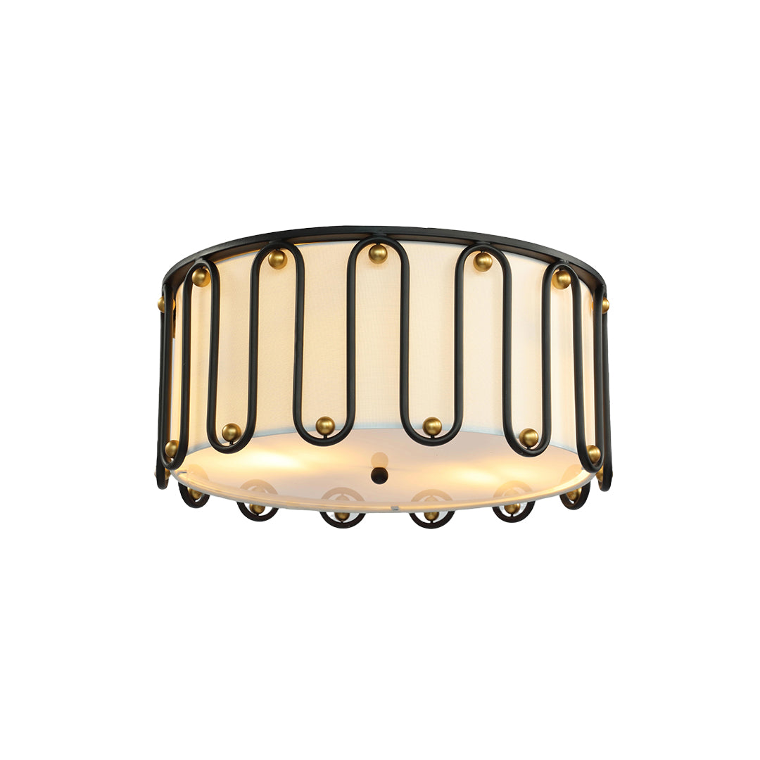 Close-up of the stylish drum ceiling light flush mount featuring a white fabric inner shade and ornate black exterior frame.