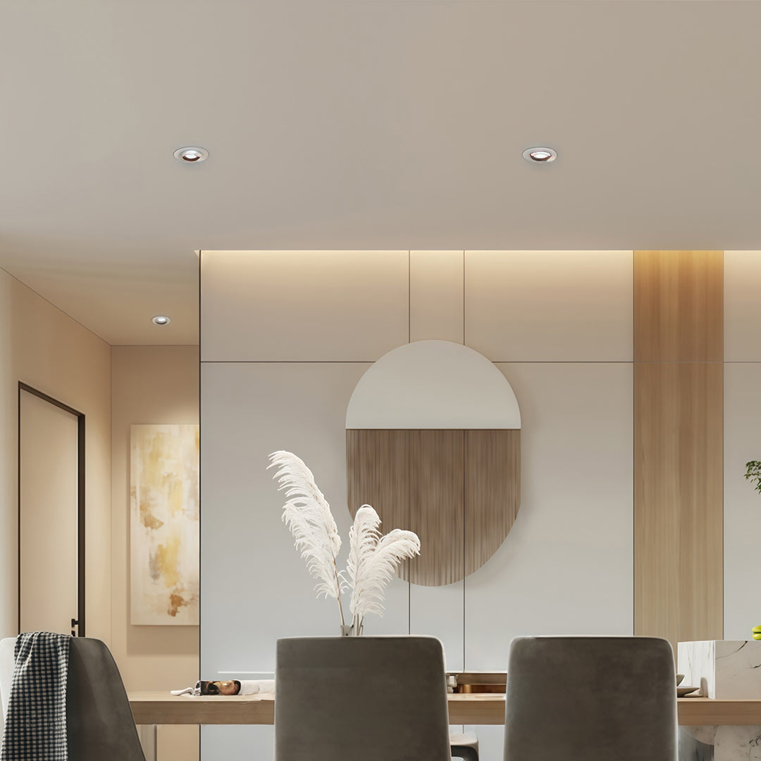 Subtle led ceiling downlights enhancing the modern decor in an elegant dining room setting.
