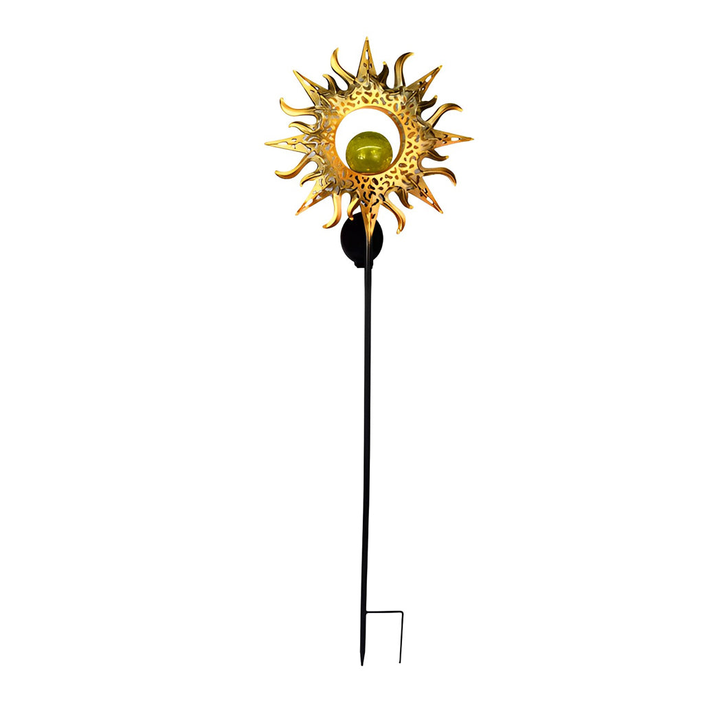Sun-shaped solar garden stake light with a decorative gold metal shade and slim black post.