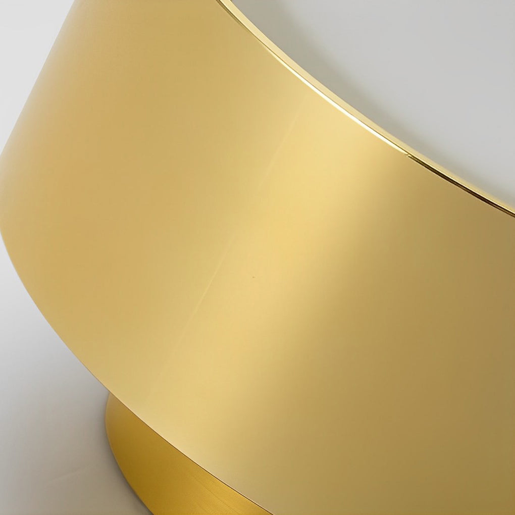 Close-up of a surface mounted LED downlight with a gold finish, showcasing its sleek design.