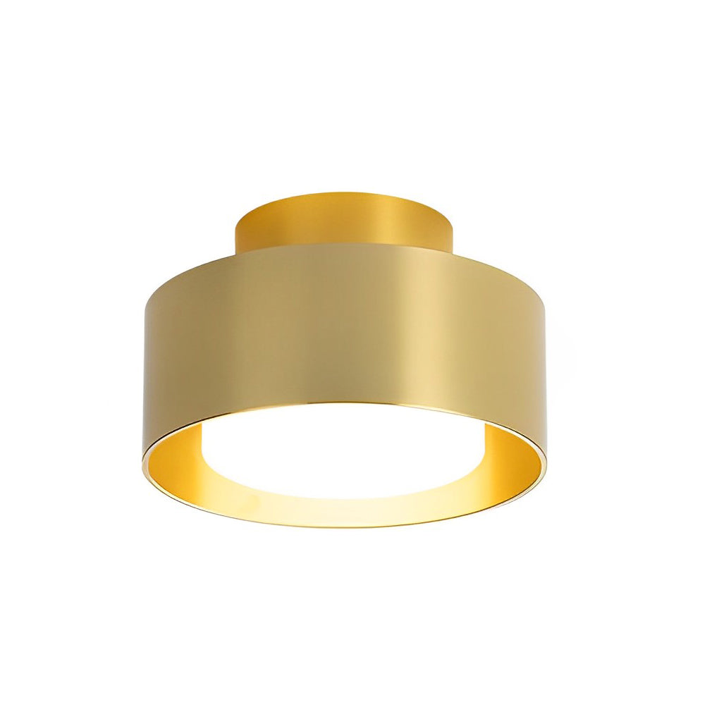 Surface mounted LED downlight in a gold finish, showcasing its elegant and contemporary design.