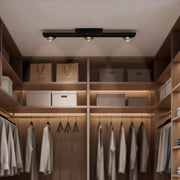 Sleek surface mounted spot light, perfect for illuminating living rooms and enhancing interior design with bright, focused light.