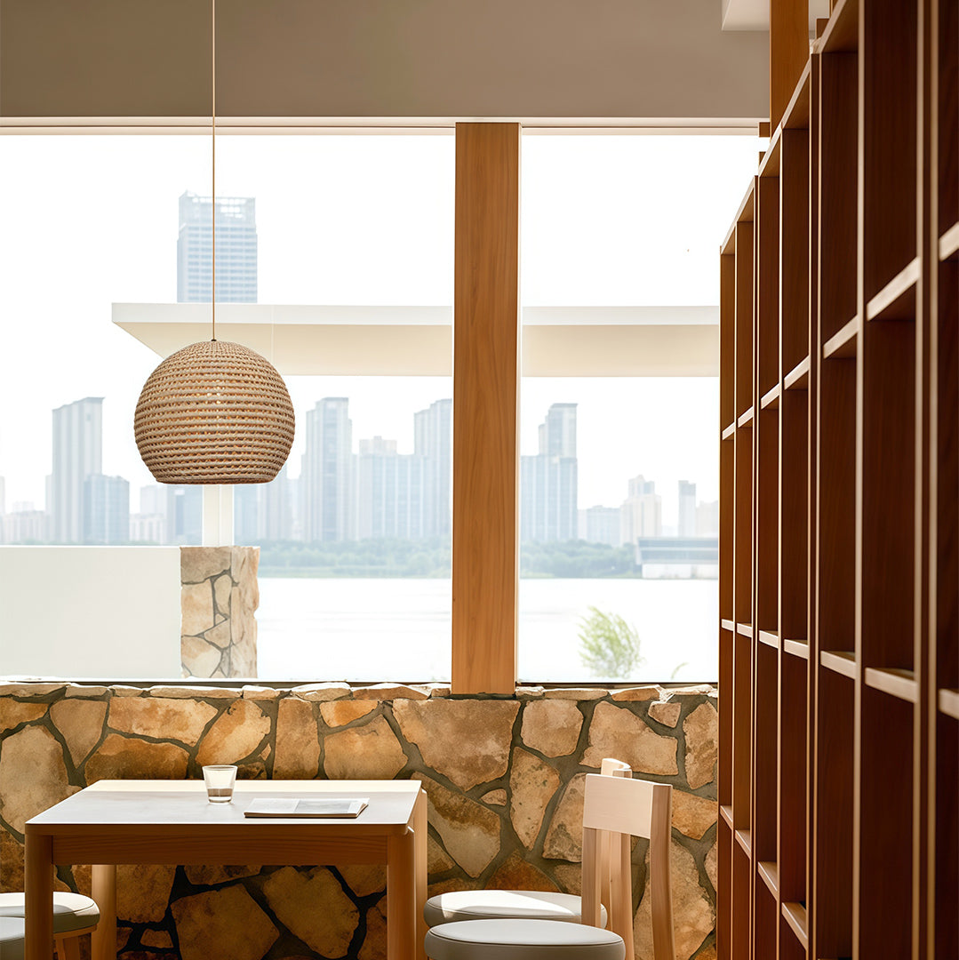 Suspended Japanese paper pendant light creating a warm, inviting atmosphere with its delicate design.