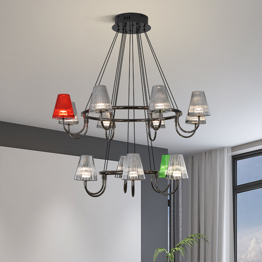 Suspended metal chandelier with ten colorful glass shades in green, red, and clear suspended from ceiling mount