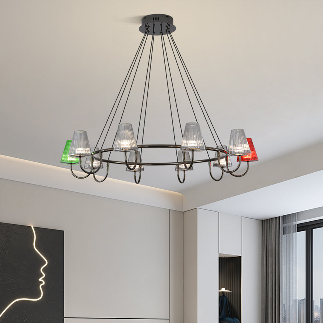Suspended metal chandelier with six colorful glass shades in green, red, and clear suspended from ceiling mount
