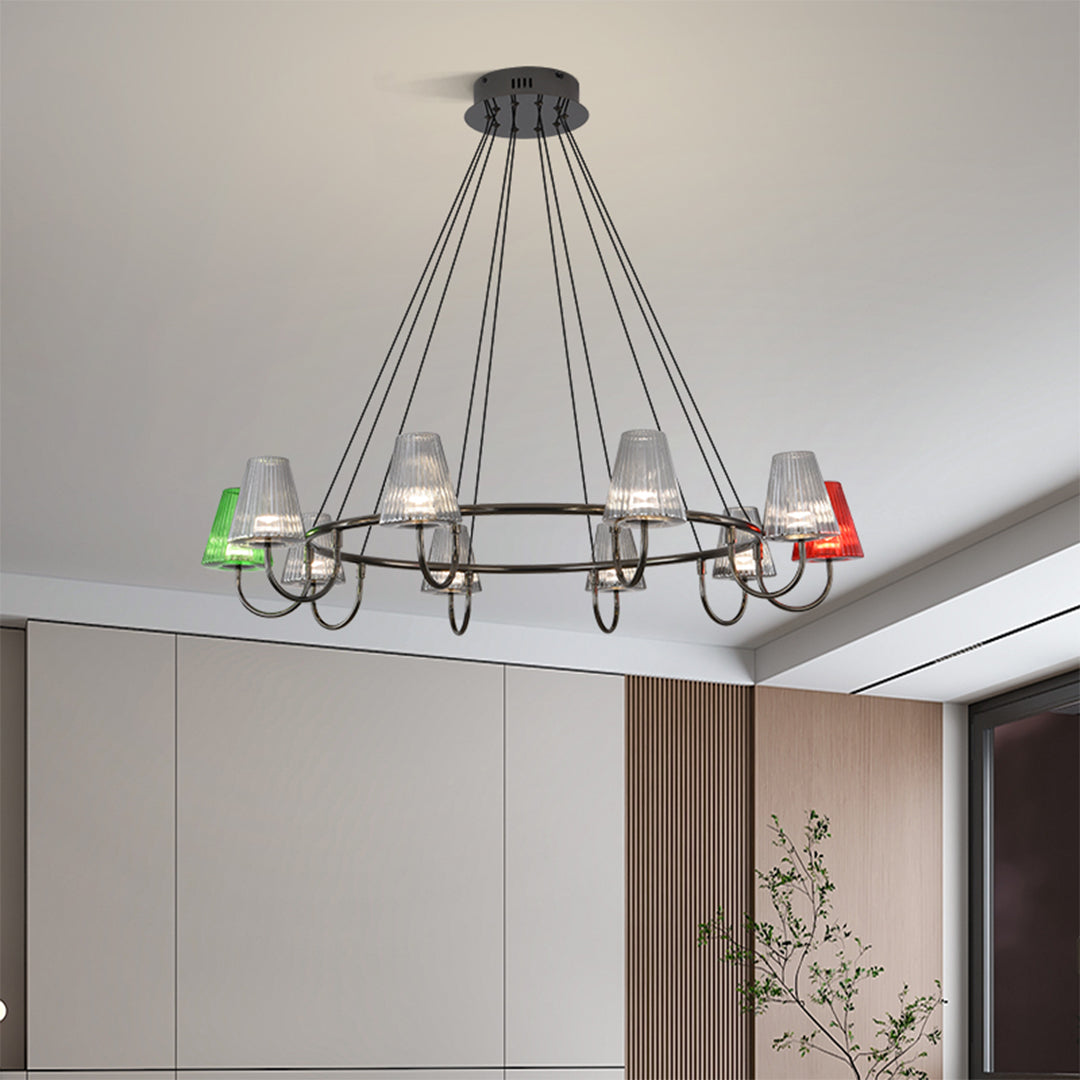 Suspended metal chandelier with six colorful glass shades in green, red, and clear suspended from ceiling mount