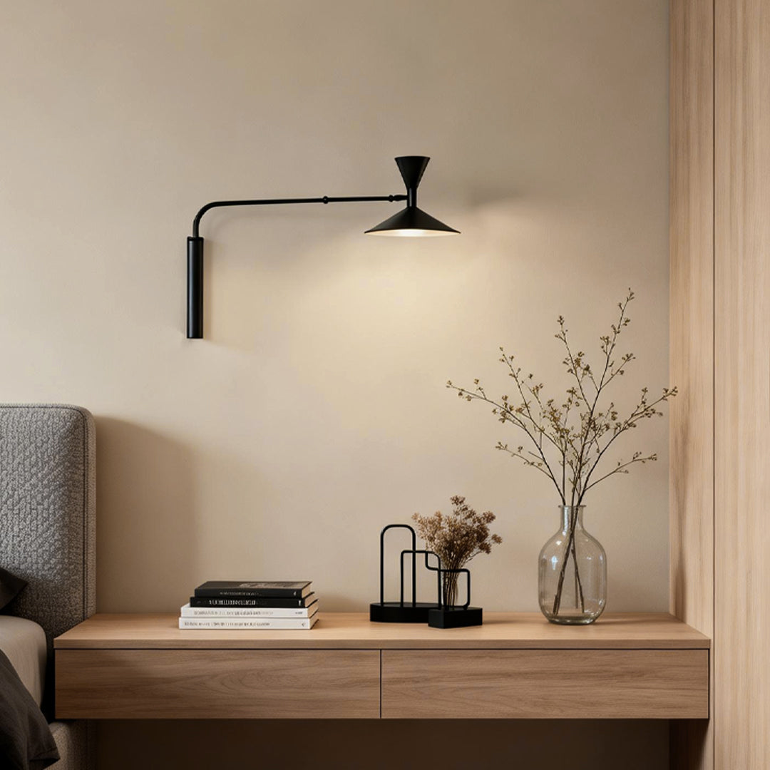 Elegant swing arm wall sconce with a minimalist design, perfect for modern living spaces, offering adjustable light direction.
