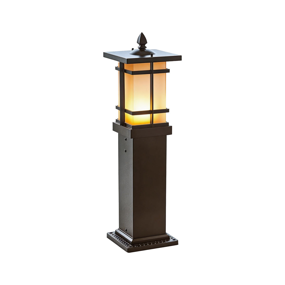 A tall black garden bollard lighting post with an extended pillar base and warm frosted lenses.