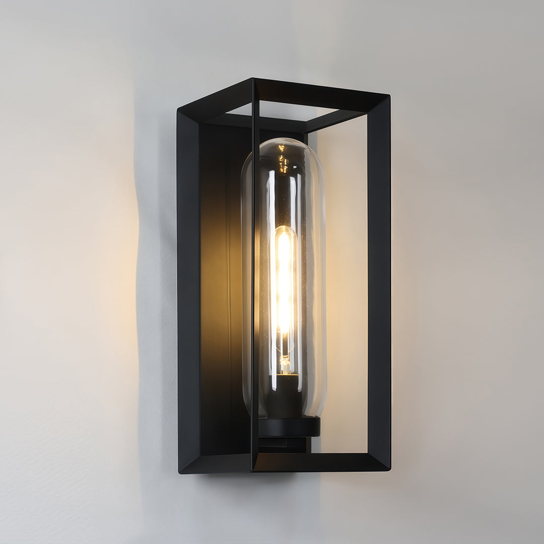 Tall black outdoor wall sconce modern design with vertical rectangular frame and Edison bulb