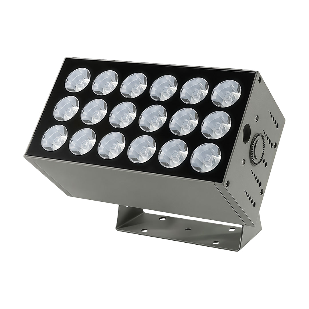 Tall commercial building with square wall wash light highlighting vertical columns.