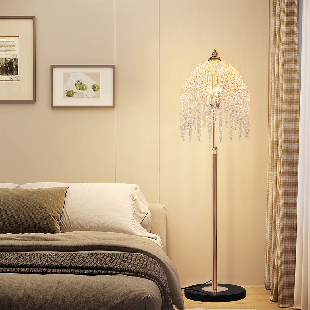 Bedroom setting with gold teardrop floor crystal lamps, providing soft and elegant illumination.