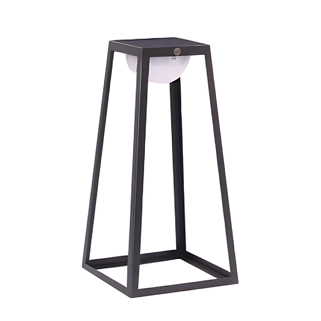 Tall geometric LED lantern with black metal frame and tapered design against white background