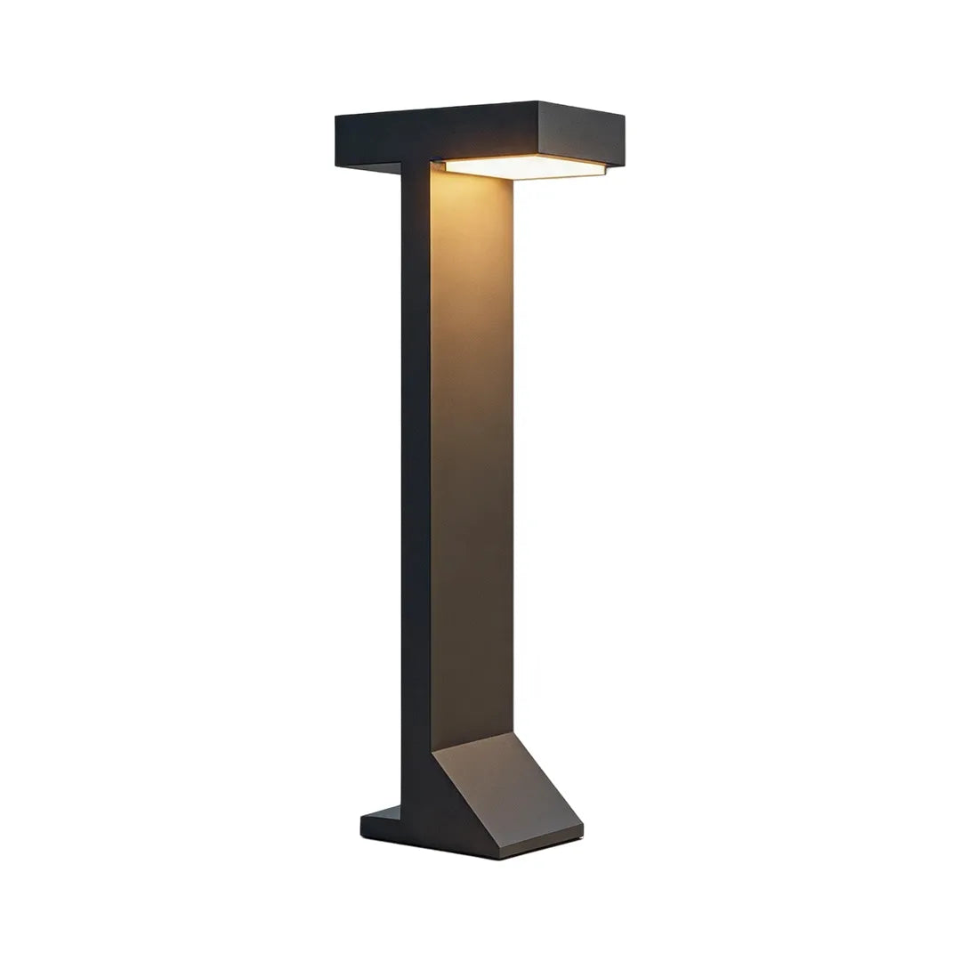 Tall modern solar bollard light with black metal frame and warm downward lighting