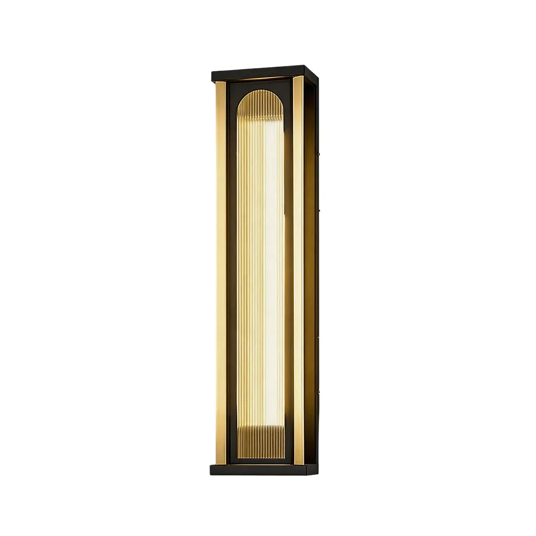 Tall outdoor wall sconce with warm vertical lighting and black frame