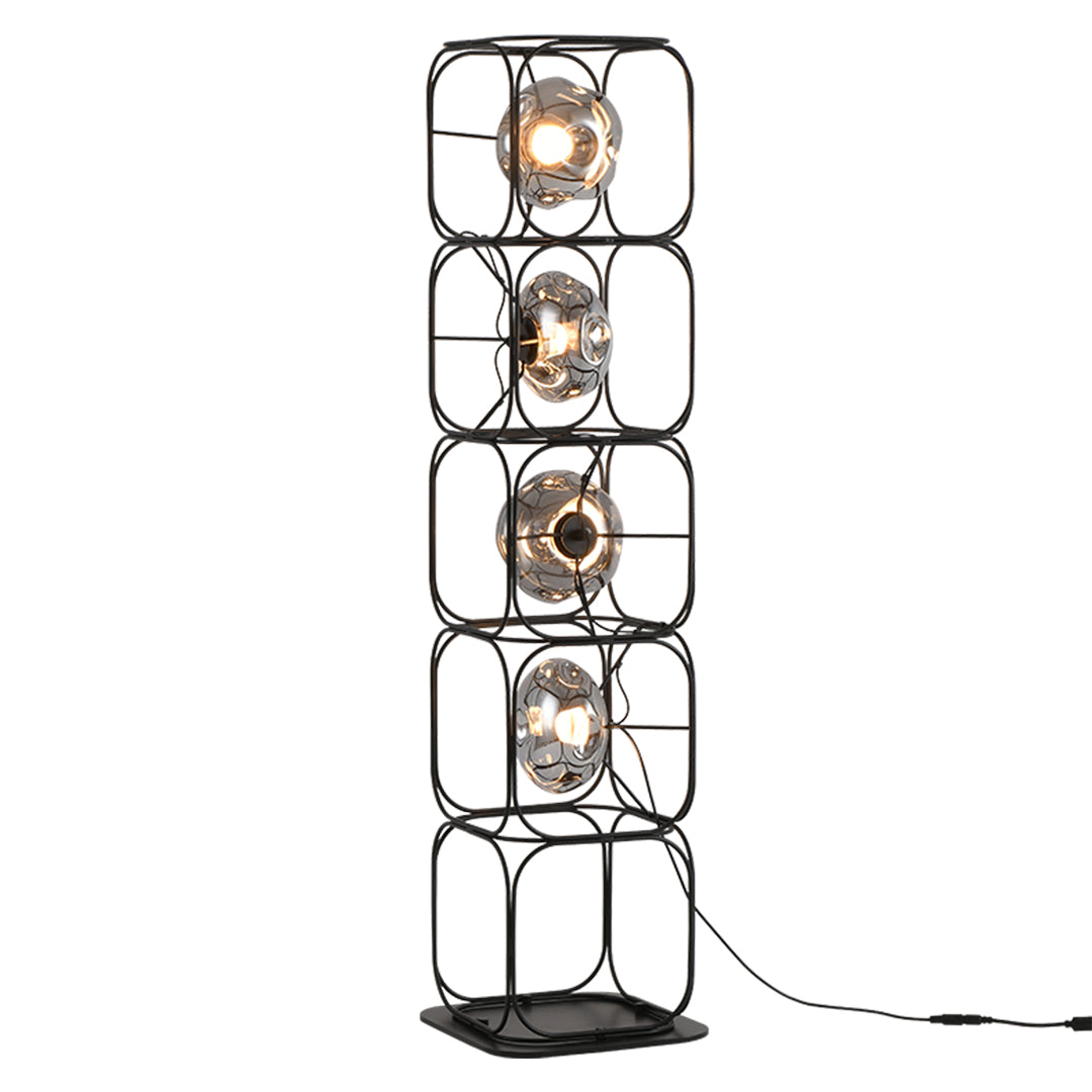 Tall stacked cube table lamp configuration with multiple geometric modules in sleek modern setup