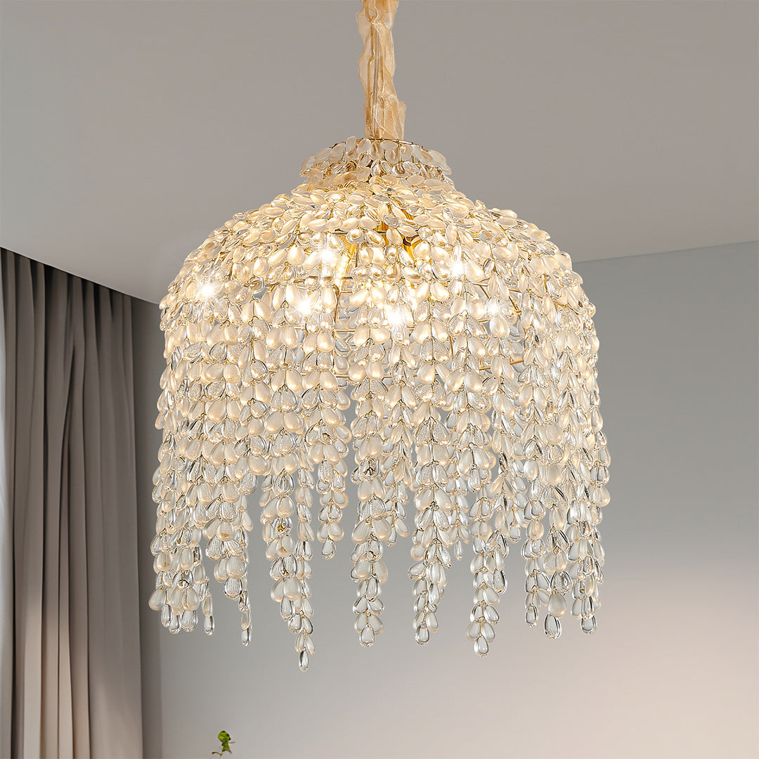 Large teardrop crystal chandelier with layered crystal strings and gold finish for a luxurious statement.