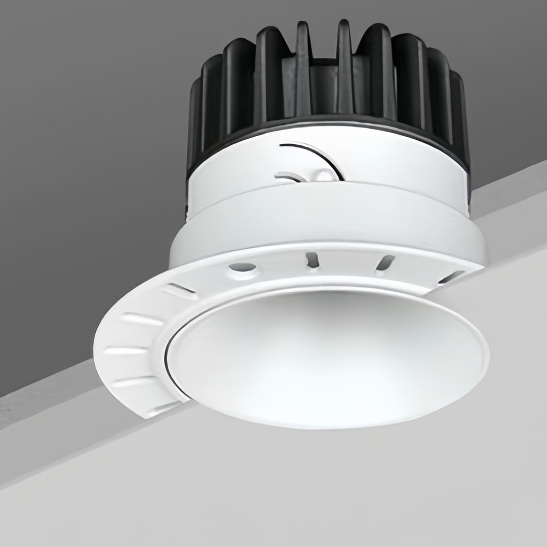 Technical view of white indoor LED spotlight module with glass shade chandelier inspired reflector and advanced heatsink design.