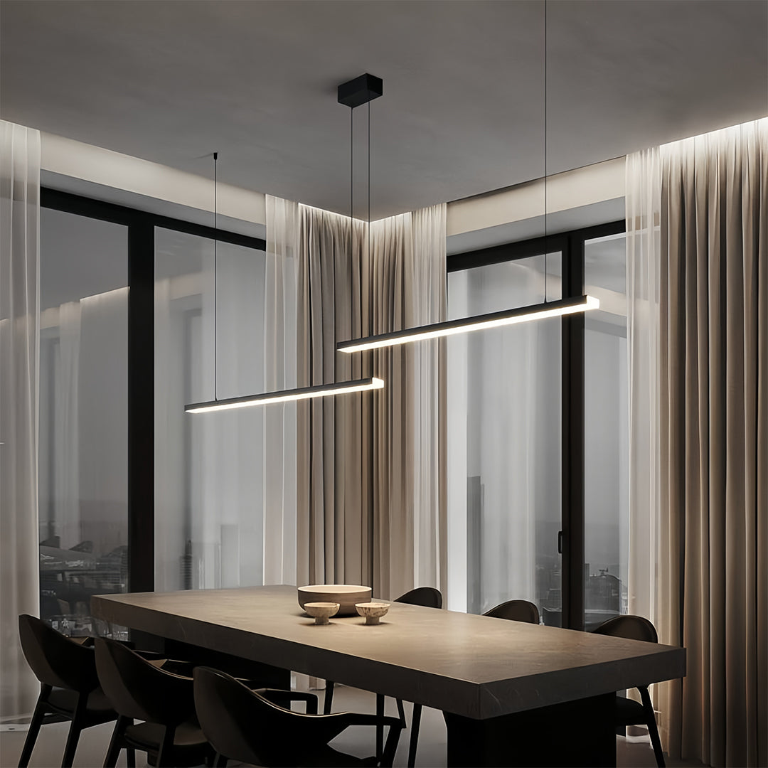 Close-up detail of small black pendant light showing premium textured finish