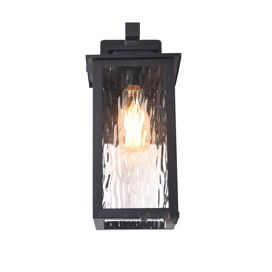 Traditional black lantern with textured glass creating dramatic light patterns on white background