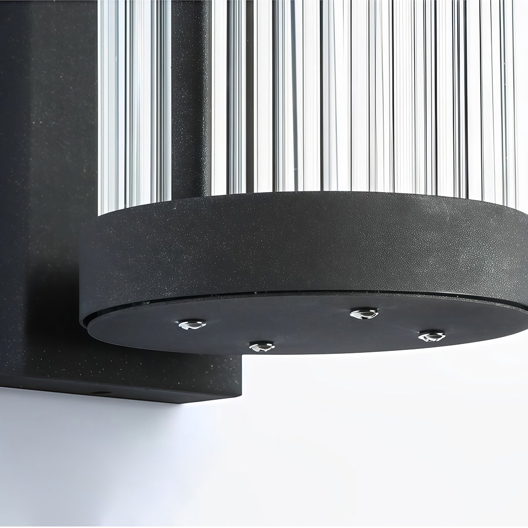 Macro detail shot showing the textured metal finish and bottom construction of durable outdoor wall mount lights.