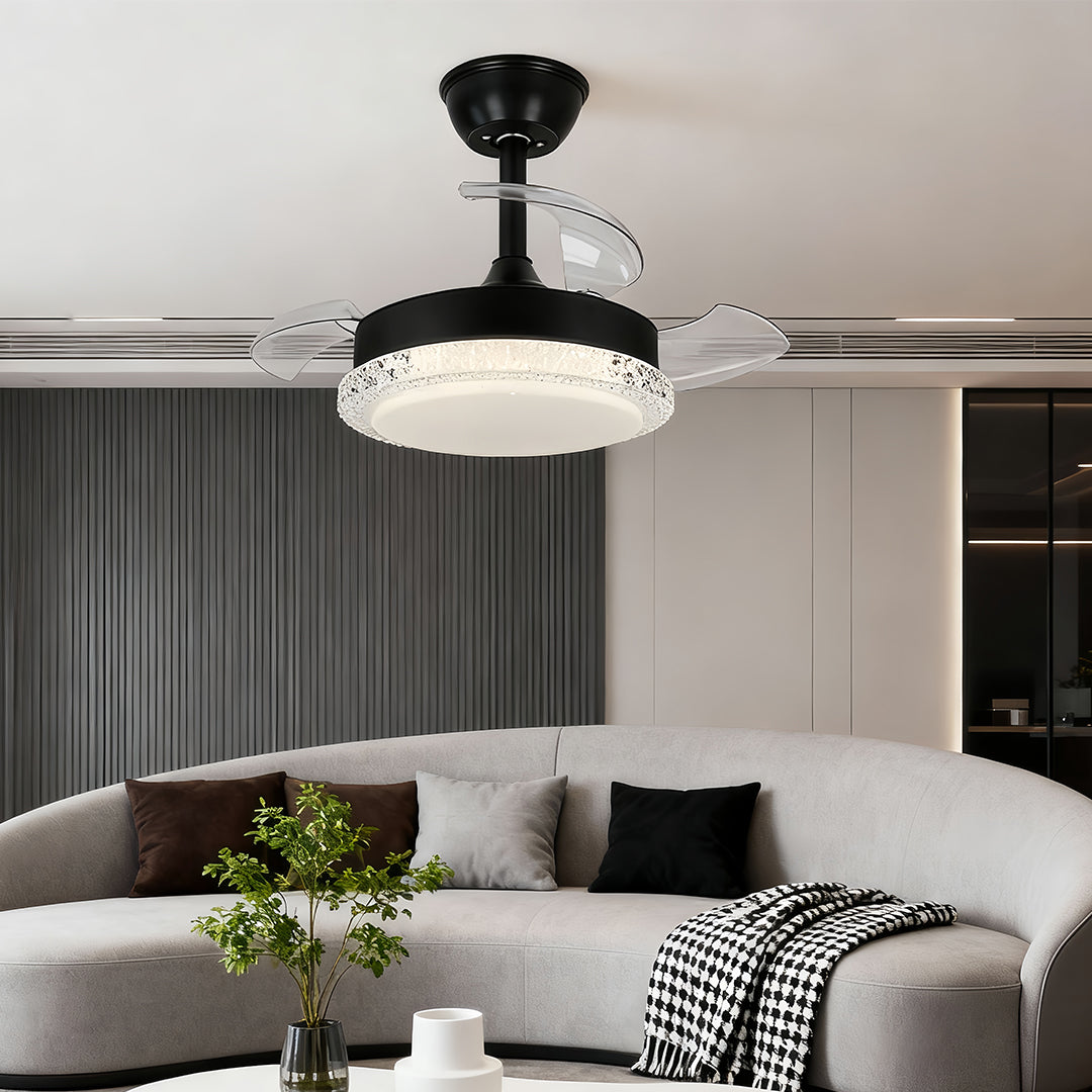 Three blade ceiling fan with light illuminating contemporary bedroom with neutral palette and plant decor.