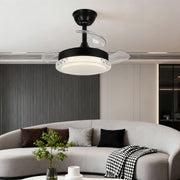 Three blade ceiling fan with light illuminating contemporary bedroom with neutral palette and plant decor.