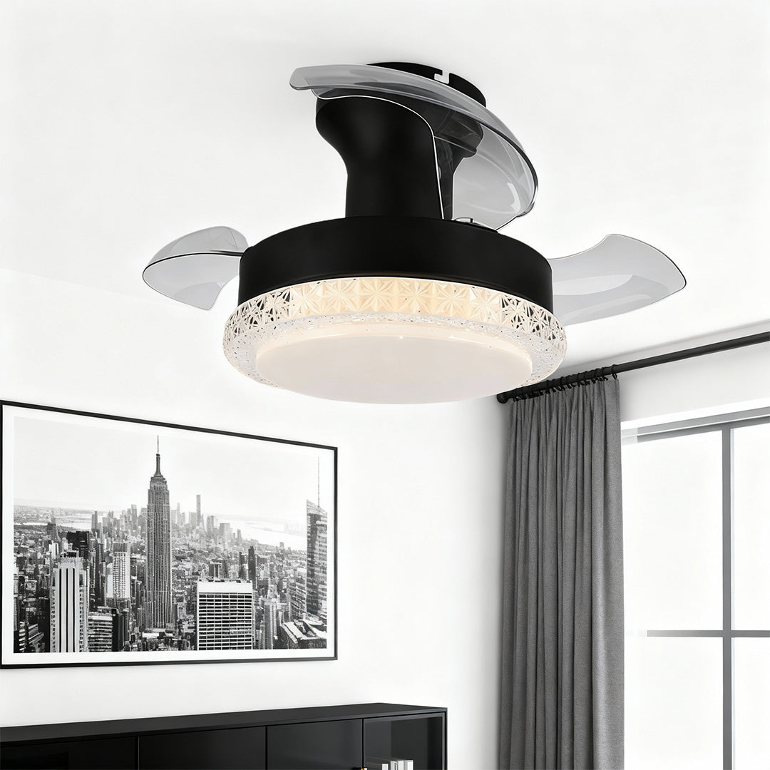 Three blade ceiling fan with light installed in contemporary black bedroom with city artwork.