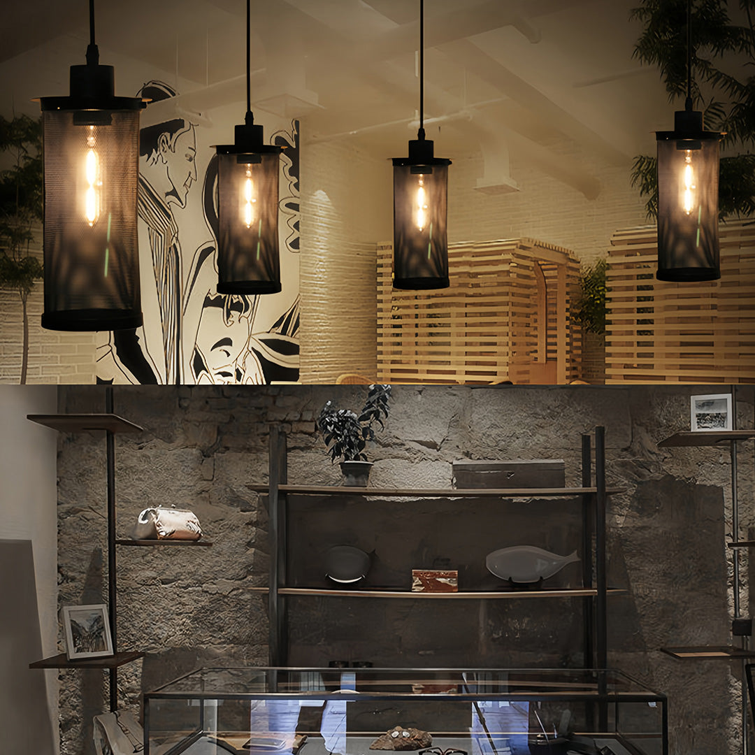 Three retro industrial pendant lights with mesh cages illuminating a stylish, modern cafe with concrete and wood textures.