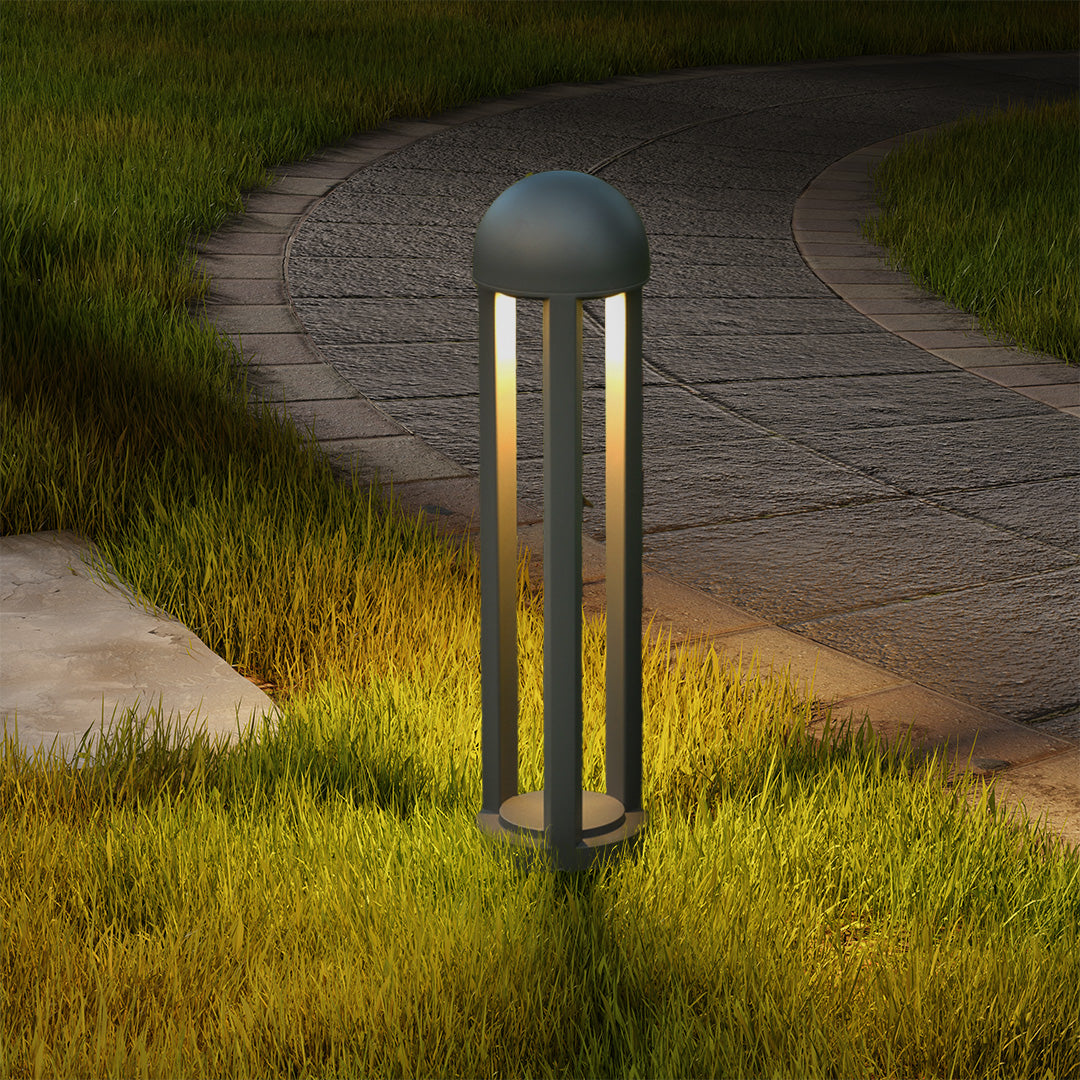 Cylindrical base with three vertical light slots for multi-directional illumination