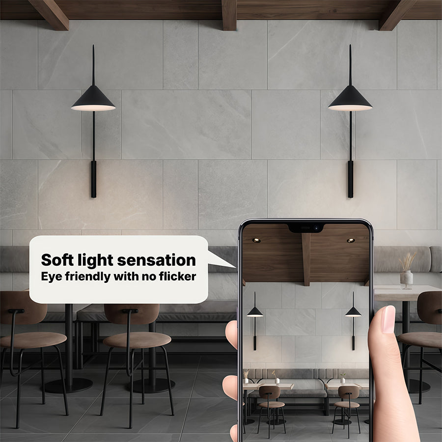 Three wall arm lights suspended in commercial dining space with promotional text overlay on image.