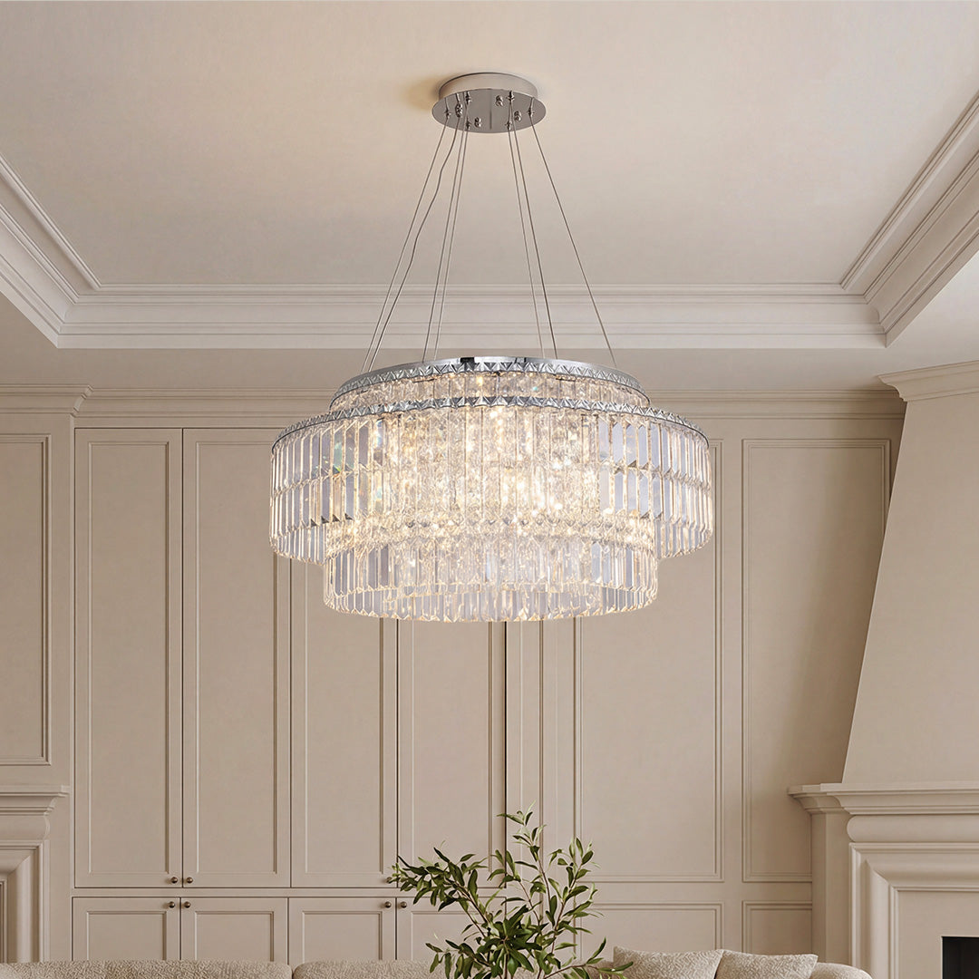 Luxurious tiered chandelier with round crystals design, featuring sparkling clear prisms and a chrome finish in an elegant room.