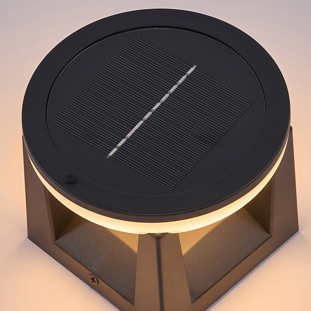 Top-down view of the solar powered bollard light showcasing its large, round, integrated solar panel.